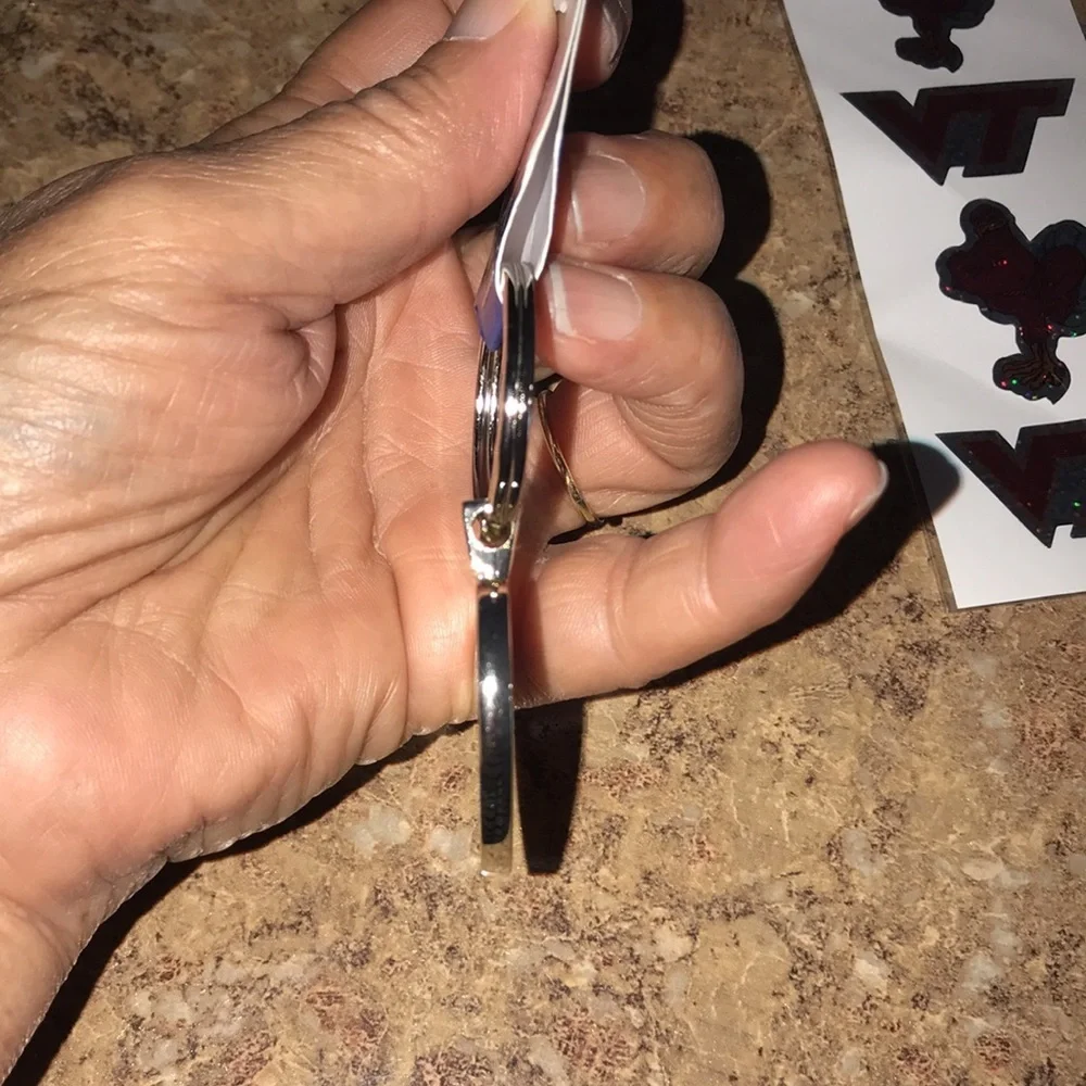 New Women’s VT Keychain + Stickers